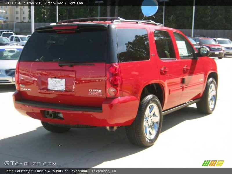 Victory Red / Light Tan 2011 GMC Yukon SLT