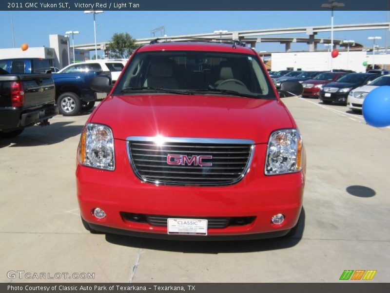 Victory Red / Light Tan 2011 GMC Yukon SLT