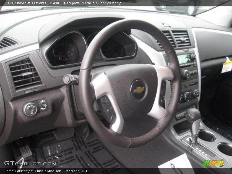 Red Jewel Metallic / Ebony/Ebony 2011 Chevrolet Traverse LT AWD