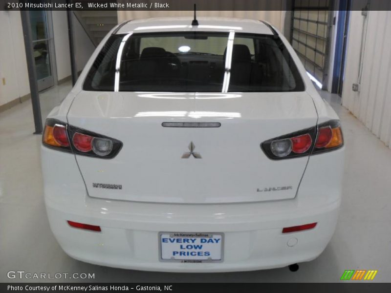 Wicked White Metallic / Black 2010 Mitsubishi Lancer ES