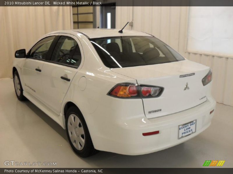 Wicked White Metallic / Black 2010 Mitsubishi Lancer DE