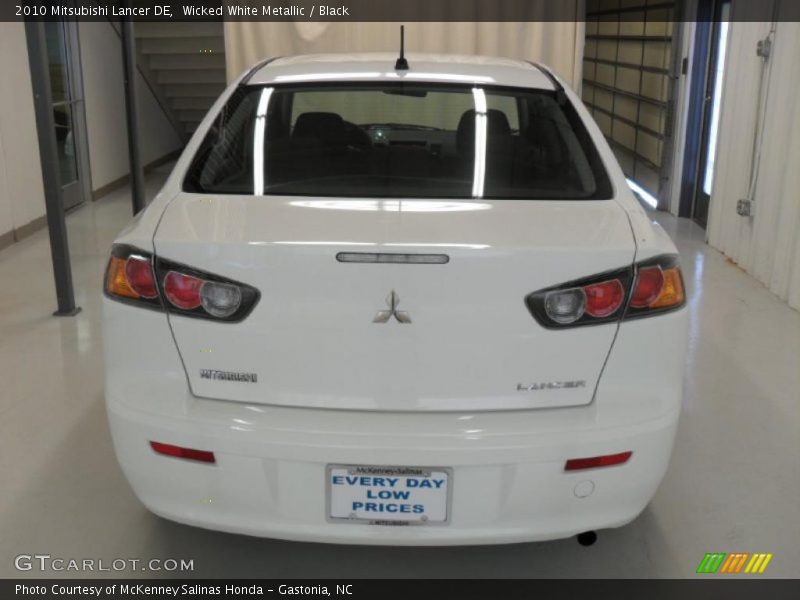 Wicked White Metallic / Black 2010 Mitsubishi Lancer DE