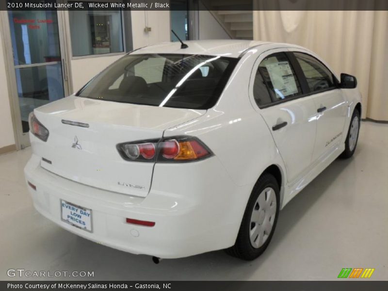 Wicked White Metallic / Black 2010 Mitsubishi Lancer DE