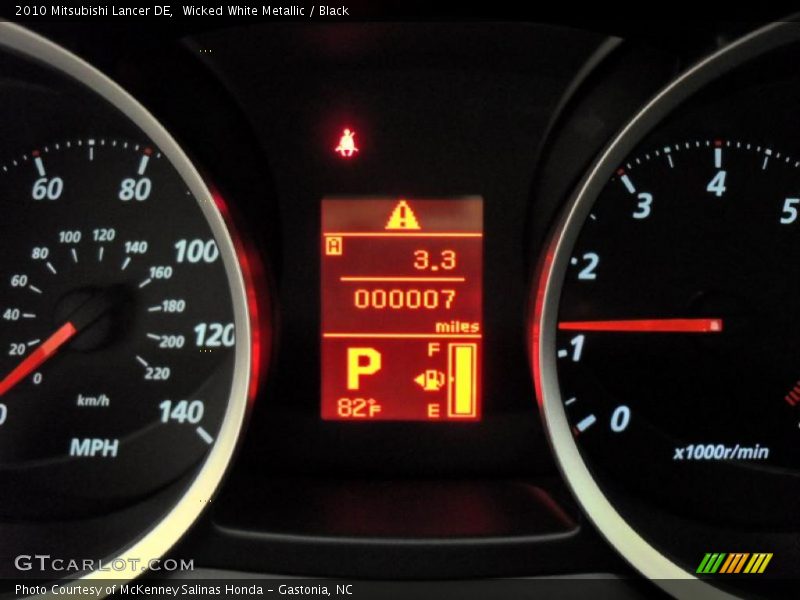 Wicked White Metallic / Black 2010 Mitsubishi Lancer DE