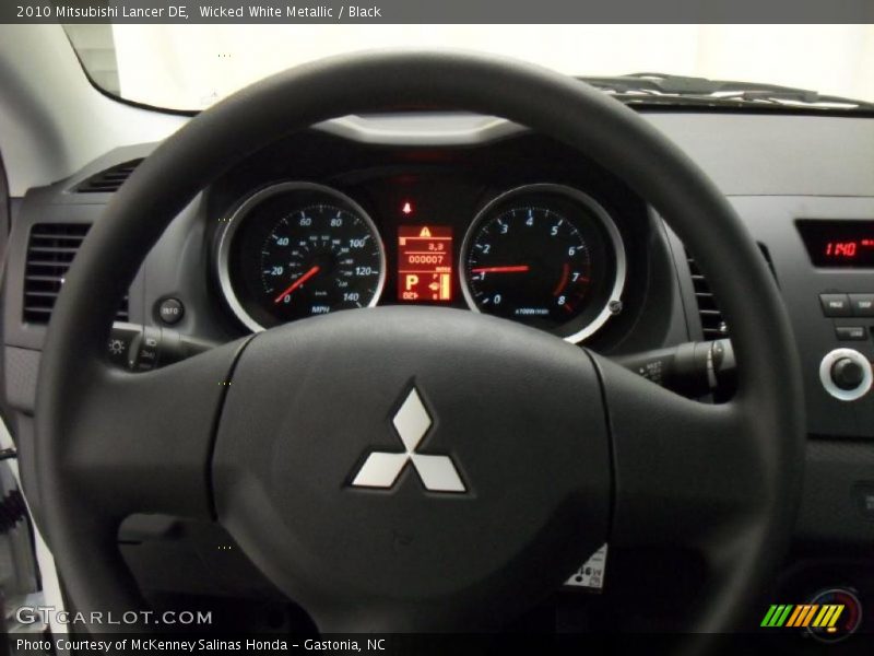 Wicked White Metallic / Black 2010 Mitsubishi Lancer DE
