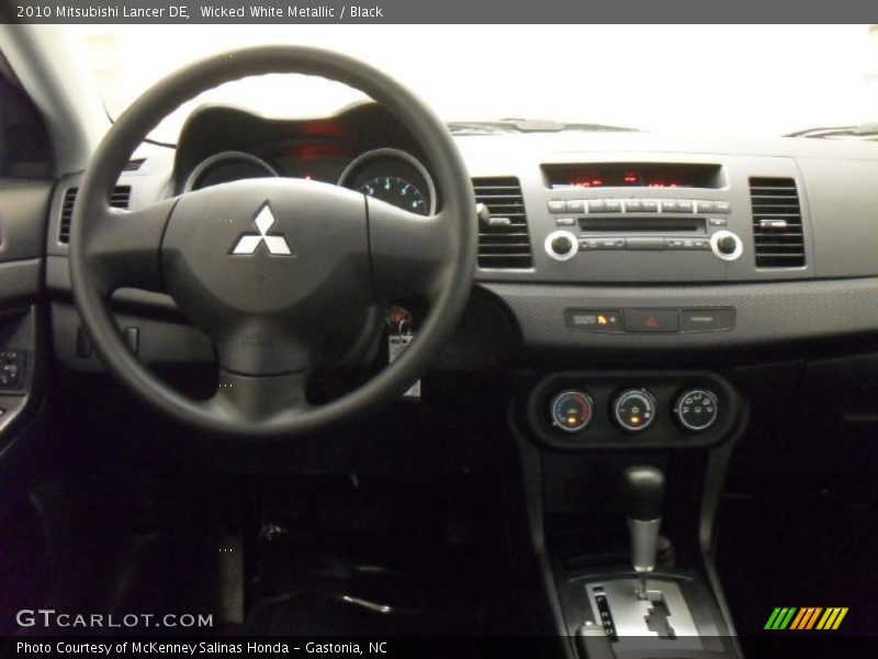 Wicked White Metallic / Black 2010 Mitsubishi Lancer DE