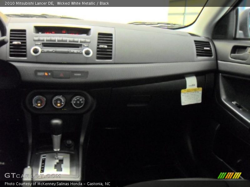 Wicked White Metallic / Black 2010 Mitsubishi Lancer DE