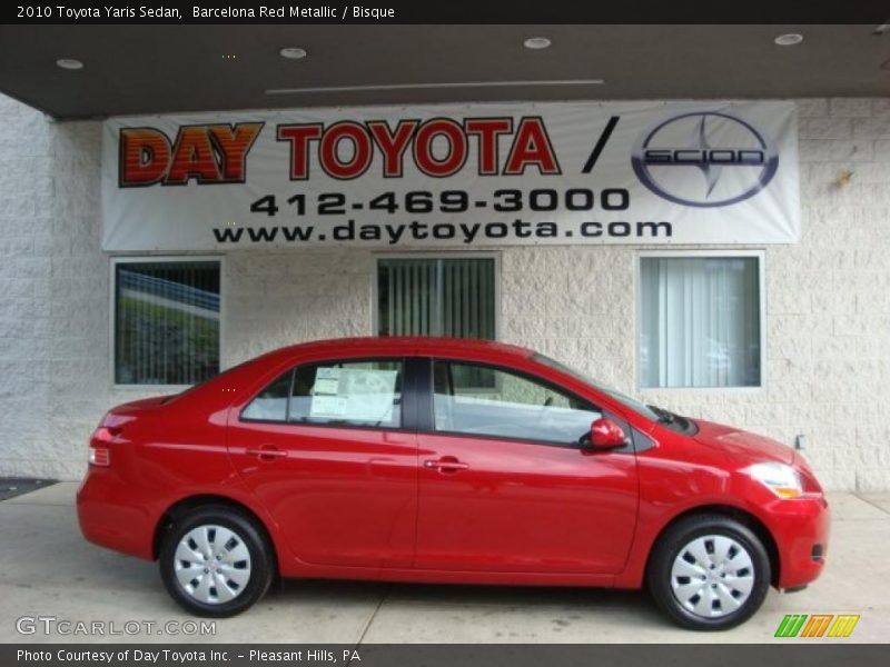 Barcelona Red Metallic / Bisque 2010 Toyota Yaris Sedan
