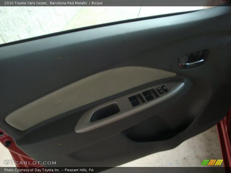 Barcelona Red Metallic / Bisque 2010 Toyota Yaris Sedan