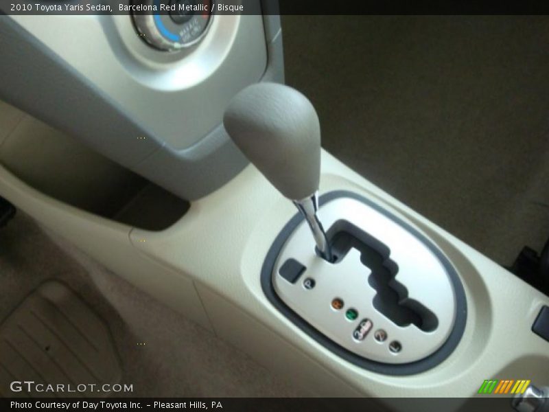 Barcelona Red Metallic / Bisque 2010 Toyota Yaris Sedan