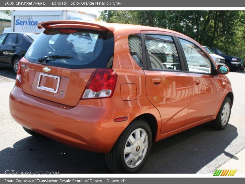 Spicy Orange Metallic / Gray 2005 Chevrolet Aveo LT Hatchback