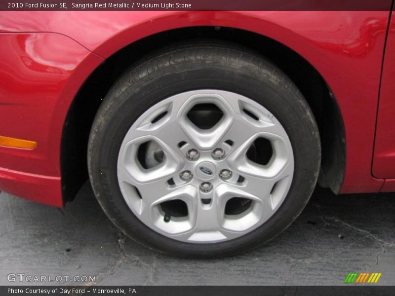 Sangria Red Metallic / Medium Light Stone 2010 Ford Fusion SE