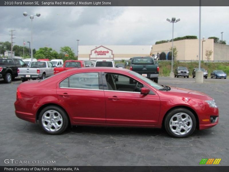 Sangria Red Metallic / Medium Light Stone 2010 Ford Fusion SE
