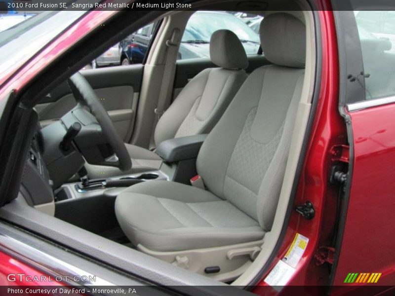 Sangria Red Metallic / Medium Light Stone 2010 Ford Fusion SE