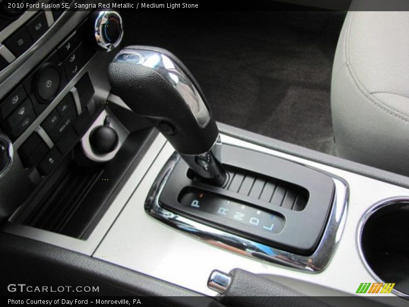 Sangria Red Metallic / Medium Light Stone 2010 Ford Fusion SE