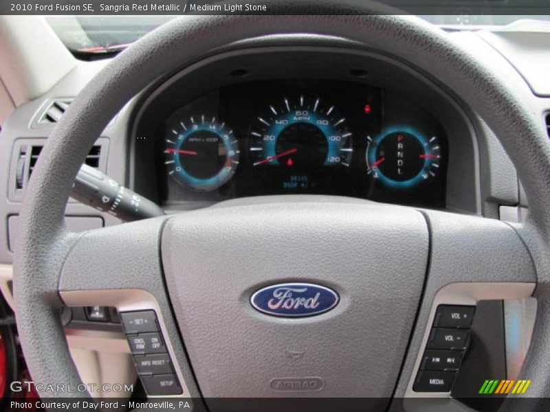 Sangria Red Metallic / Medium Light Stone 2010 Ford Fusion SE