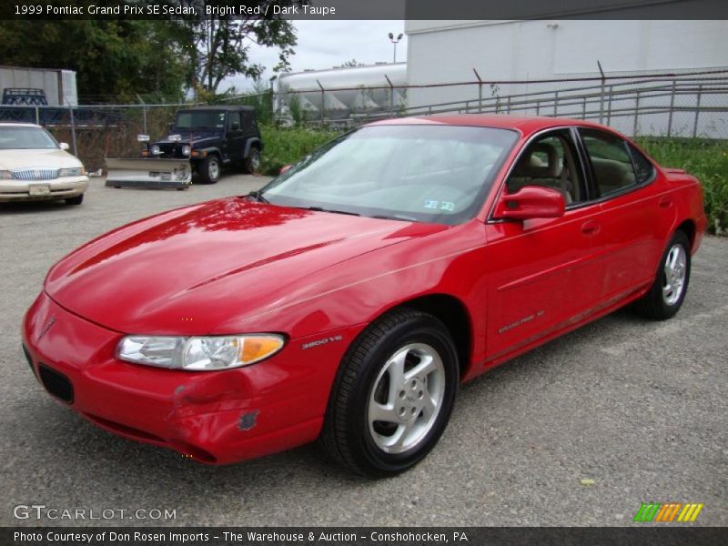 Bright Red / Dark Taupe 1999 Pontiac Grand Prix SE Sedan