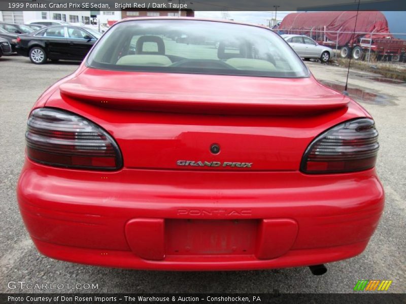 Bright Red / Dark Taupe 1999 Pontiac Grand Prix SE Sedan