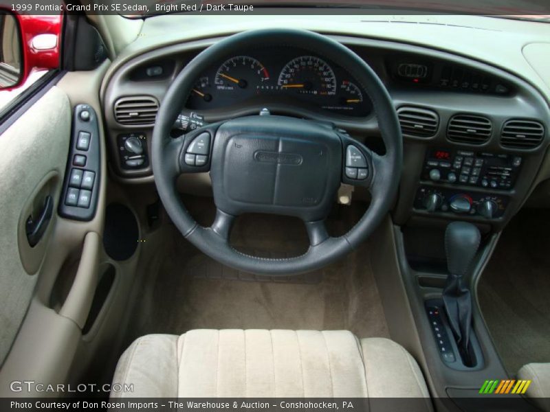 Bright Red / Dark Taupe 1999 Pontiac Grand Prix SE Sedan