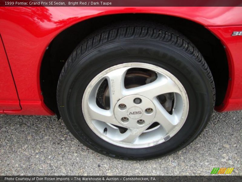 Bright Red / Dark Taupe 1999 Pontiac Grand Prix SE Sedan