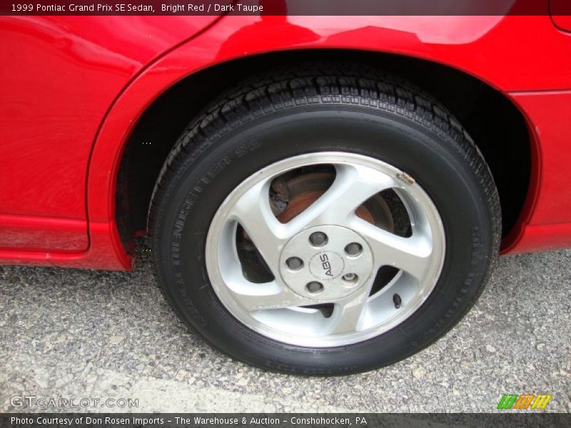 Bright Red / Dark Taupe 1999 Pontiac Grand Prix SE Sedan