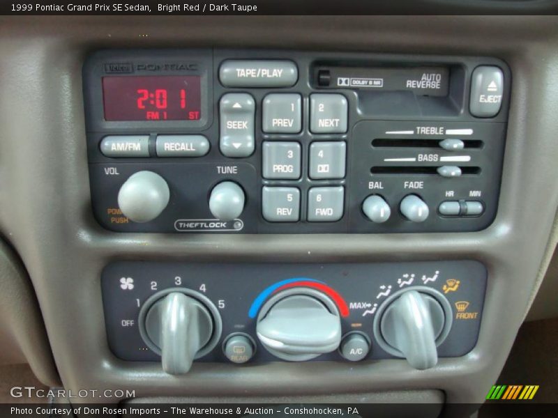 Bright Red / Dark Taupe 1999 Pontiac Grand Prix SE Sedan