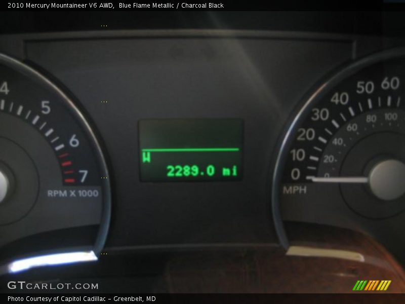 Blue Flame Metallic / Charcoal Black 2010 Mercury Mountaineer V6 AWD