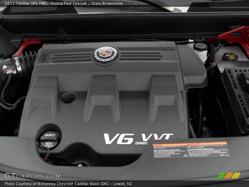 Crystal Red Tintcoat / Shale/Brownstone 2011 Cadillac SRX FWD
