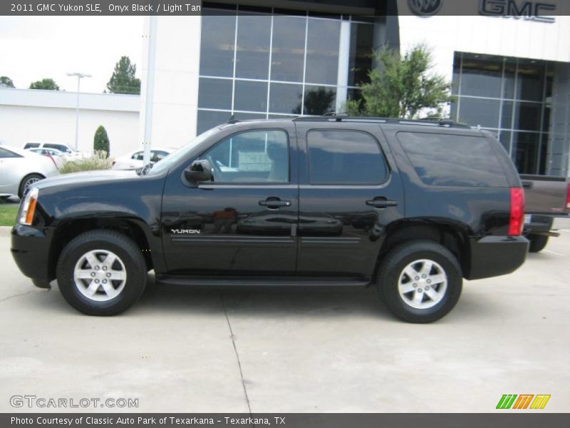 Onyx Black / Light Tan 2011 GMC Yukon SLE
