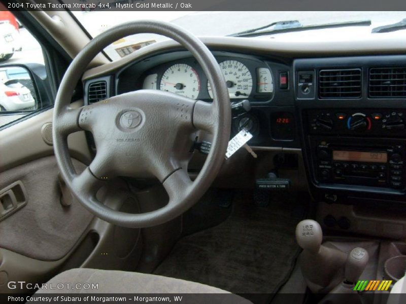 Mystic Gold Metallic / Oak 2004 Toyota Tacoma Xtracab 4x4