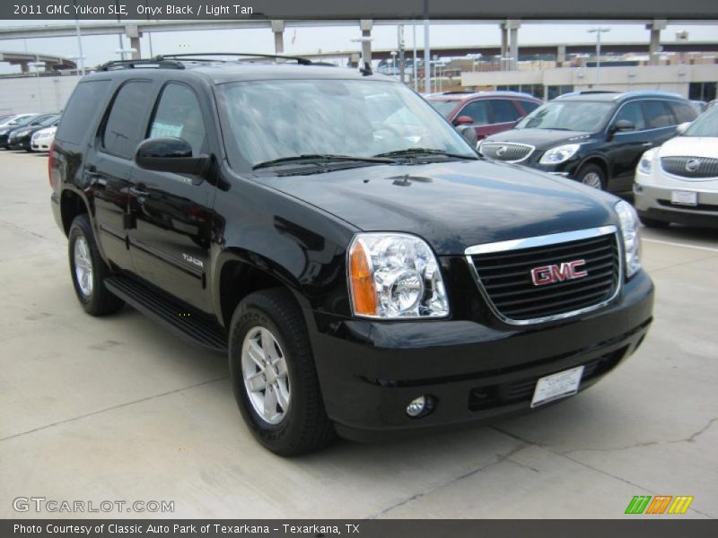 Onyx Black / Light Tan 2011 GMC Yukon SLE