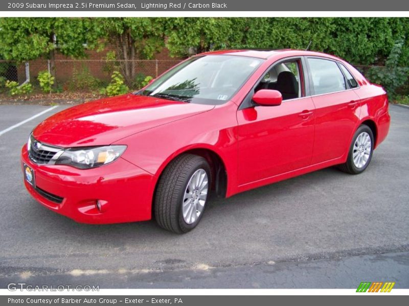 Lightning Red / Carbon Black 2009 Subaru Impreza 2.5i Premium Sedan