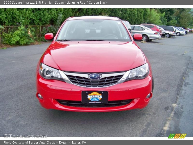 Lightning Red / Carbon Black 2009 Subaru Impreza 2.5i Premium Sedan