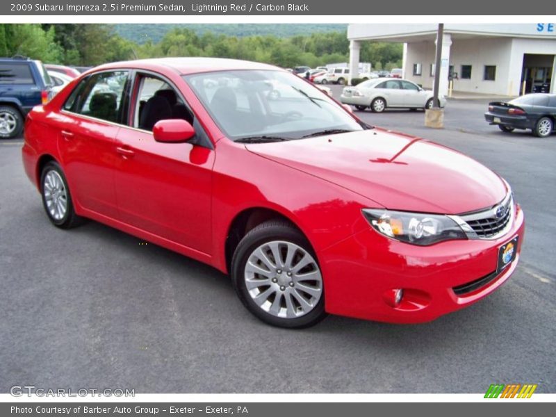 Lightning Red / Carbon Black 2009 Subaru Impreza 2.5i Premium Sedan