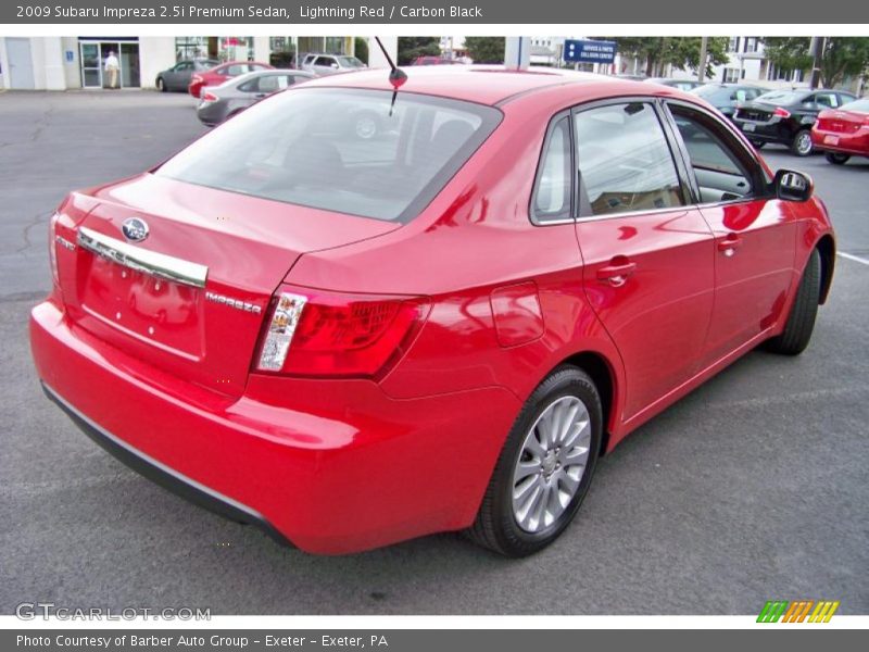 Lightning Red / Carbon Black 2009 Subaru Impreza 2.5i Premium Sedan