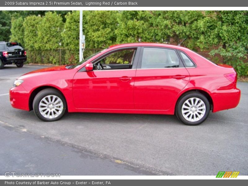 Lightning Red / Carbon Black 2009 Subaru Impreza 2.5i Premium Sedan