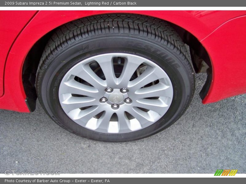 Lightning Red / Carbon Black 2009 Subaru Impreza 2.5i Premium Sedan