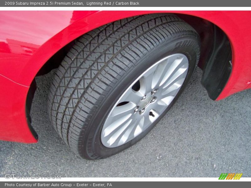 Lightning Red / Carbon Black 2009 Subaru Impreza 2.5i Premium Sedan