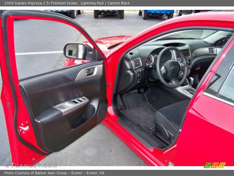 Lightning Red / Carbon Black 2009 Subaru Impreza 2.5i Premium Sedan