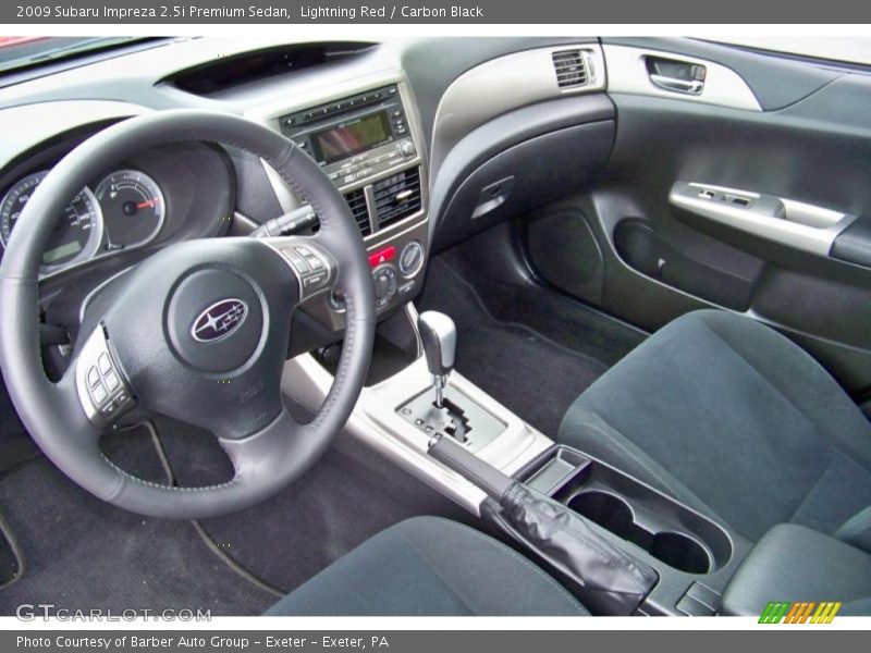 Lightning Red / Carbon Black 2009 Subaru Impreza 2.5i Premium Sedan