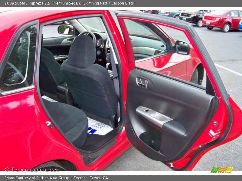 Lightning Red / Carbon Black 2009 Subaru Impreza 2.5i Premium Sedan
