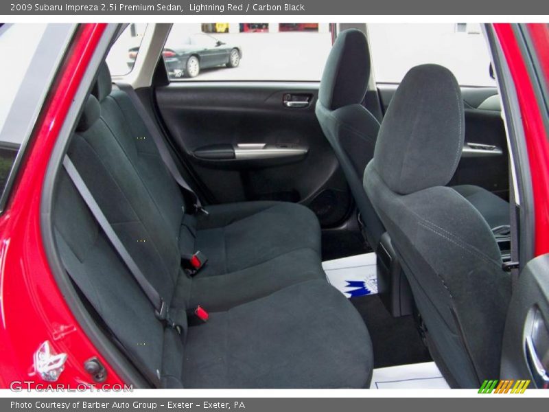 Lightning Red / Carbon Black 2009 Subaru Impreza 2.5i Premium Sedan