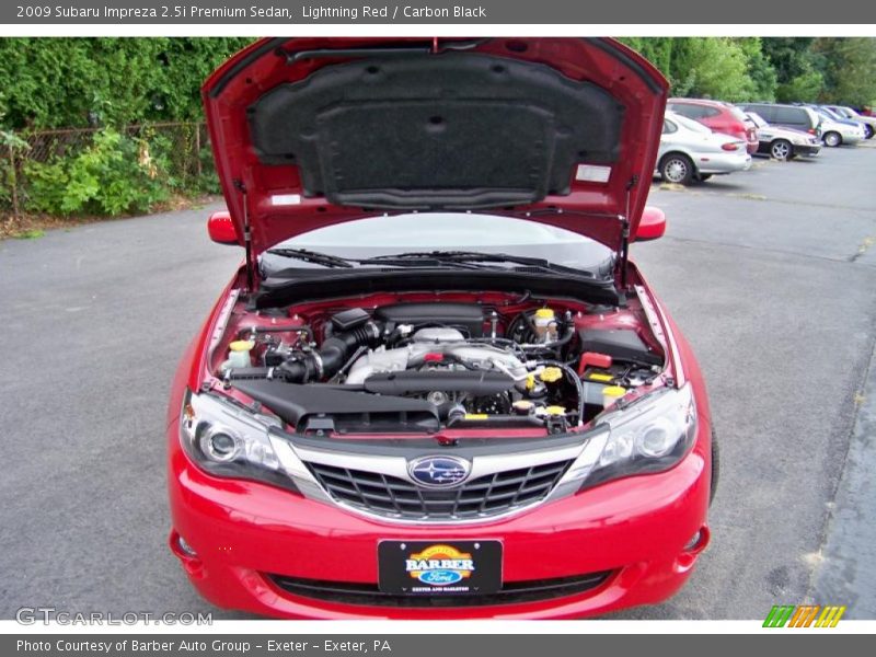 Lightning Red / Carbon Black 2009 Subaru Impreza 2.5i Premium Sedan