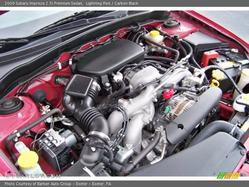 Lightning Red / Carbon Black 2009 Subaru Impreza 2.5i Premium Sedan