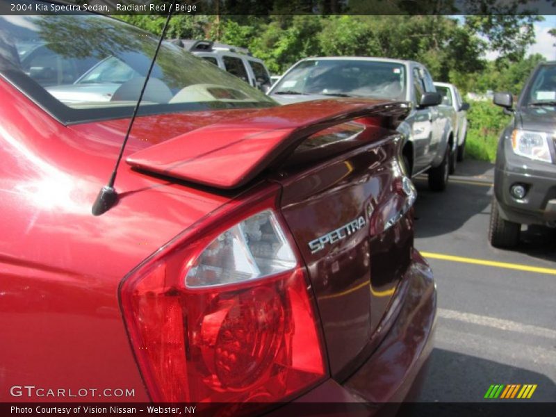 Radiant Red / Beige 2004 Kia Spectra Sedan