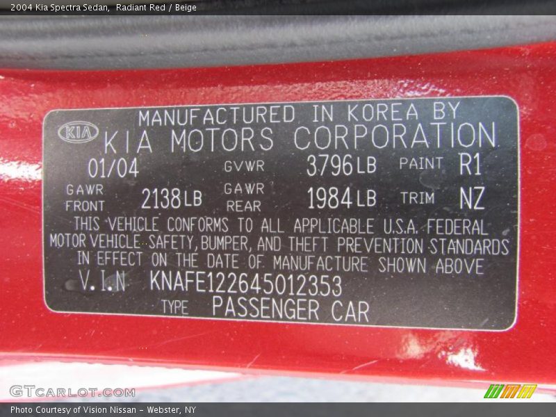 Radiant Red / Beige 2004 Kia Spectra Sedan