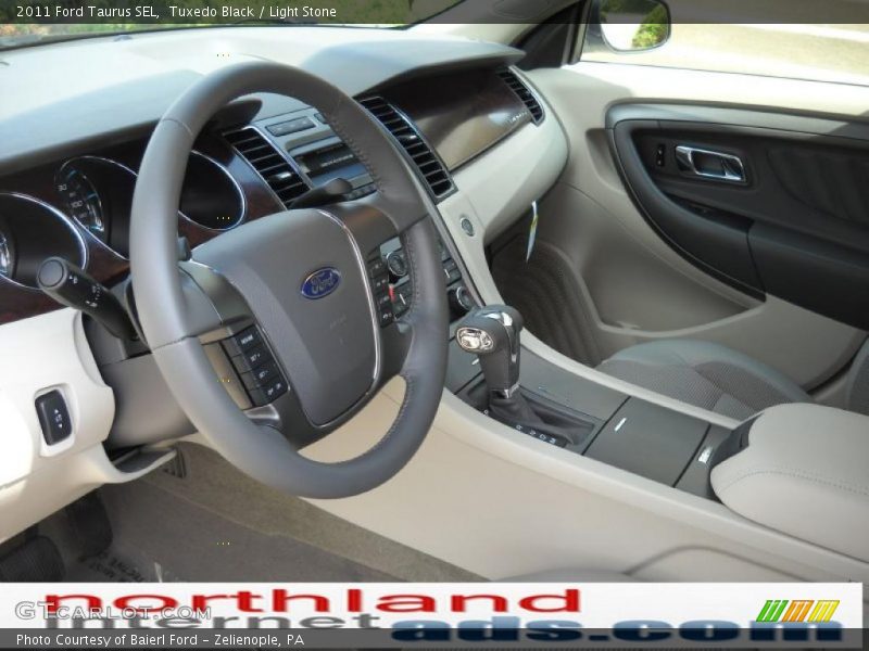 Tuxedo Black / Light Stone 2011 Ford Taurus SEL