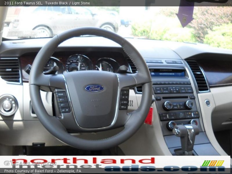 Tuxedo Black / Light Stone 2011 Ford Taurus SEL