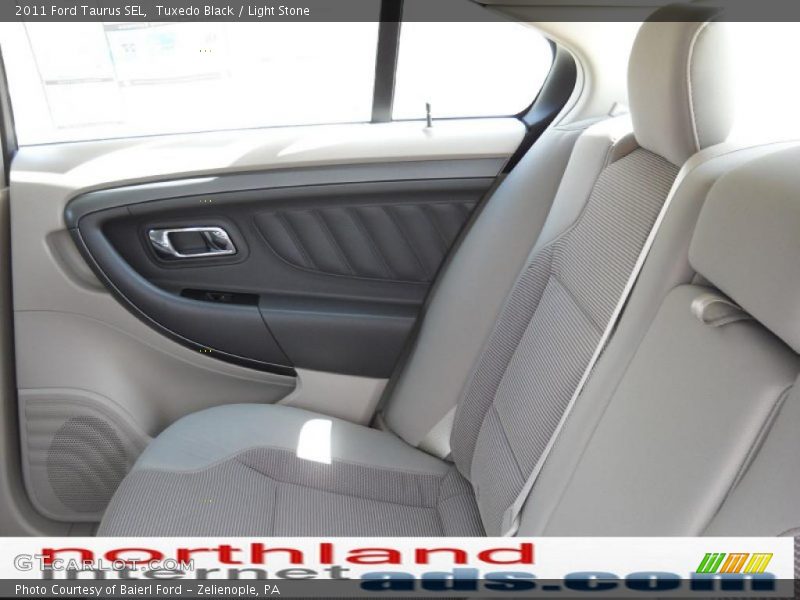 Tuxedo Black / Light Stone 2011 Ford Taurus SEL