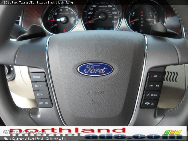Tuxedo Black / Light Stone 2011 Ford Taurus SEL